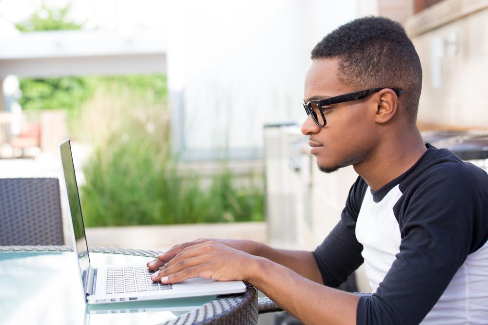 Closeup,Portrait,,Young,Nerdy,Man,In,Big,Black,Glasses,Surfing