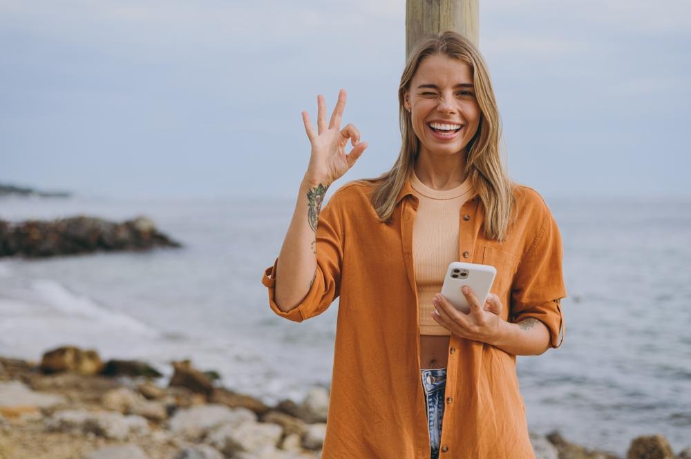 Young,Smiling,Happy,Fun,Woman,She,Wears,Orange,Shirt,Casual